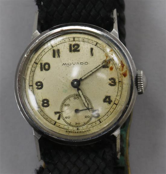 A gentlemans stainless steel Movado manual wind wrist watch.